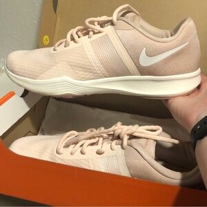 Nike light pink training shoes size 9w
